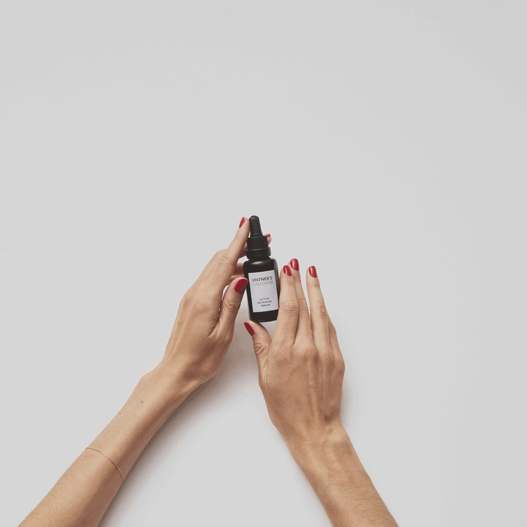 A GIF Showing a bottle of face serum