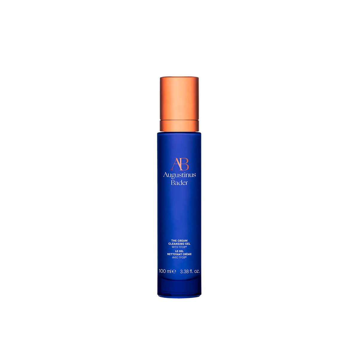 A blue pump bottle of Augustinus Bader The Cream Cleansing Gel with orange accents on the cap.