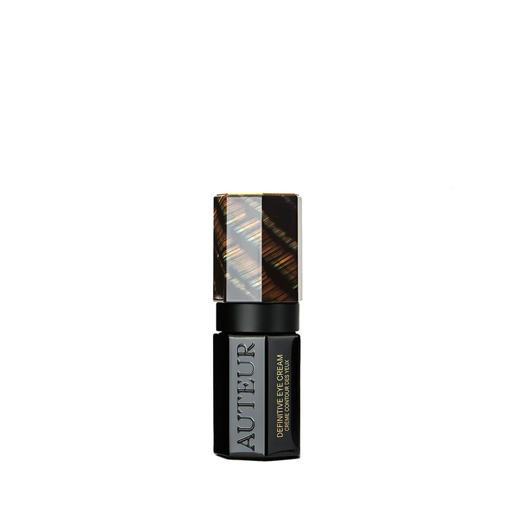 Auteur eye cream bottle with black and gold design on a white background