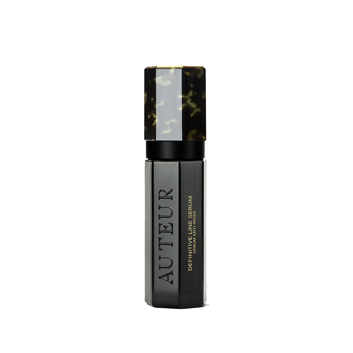 Black serum bottle with tortoiseshell cap on a white background