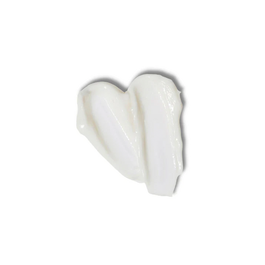 Product swatch of face mask with white creamy texture