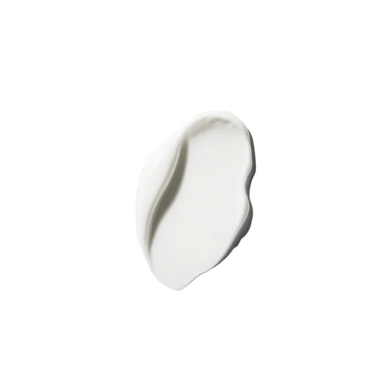 Product swatch of facial cream with white texture.