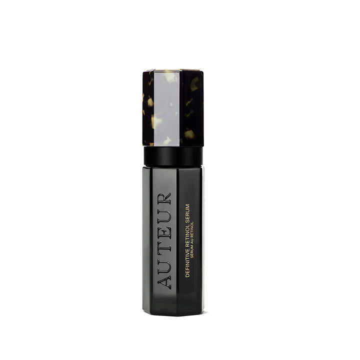 Black serum bottle with 'Auteur' branding on a white background