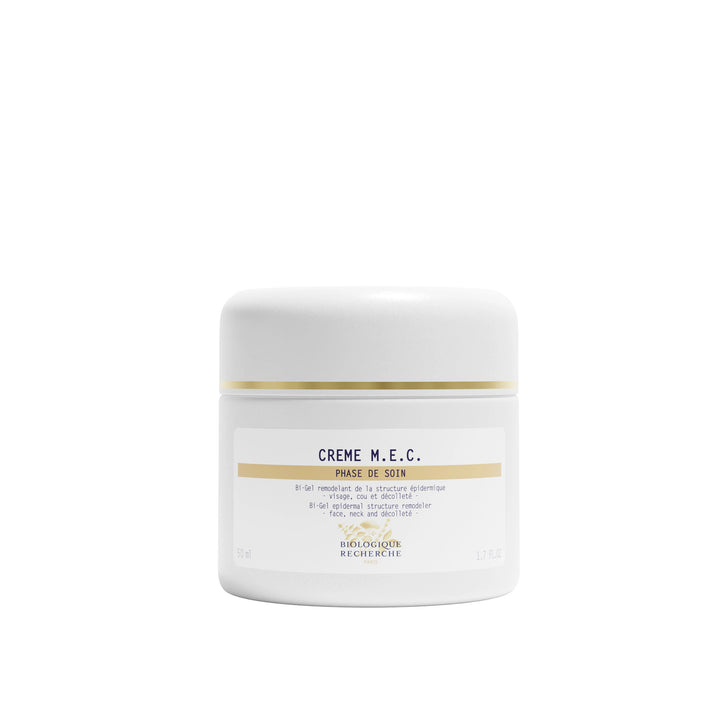 White jar of Crème M.E.C. on a white background