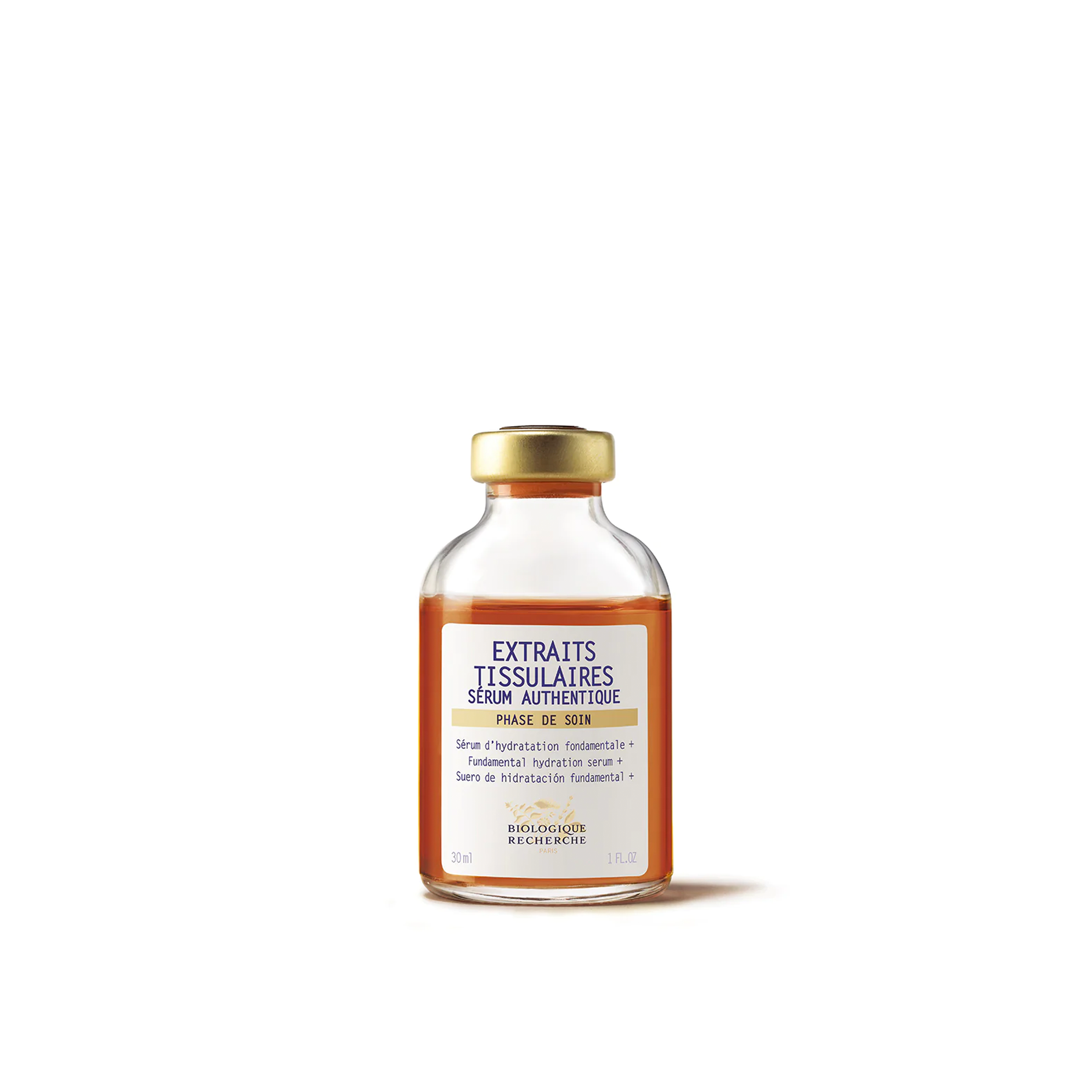 A clear glass vial with a yellow cap and label that reads 'EXTRAITS TISSULAIRES SERUM AUTHENTIQUE', indicating it is a hydration serum for the face.