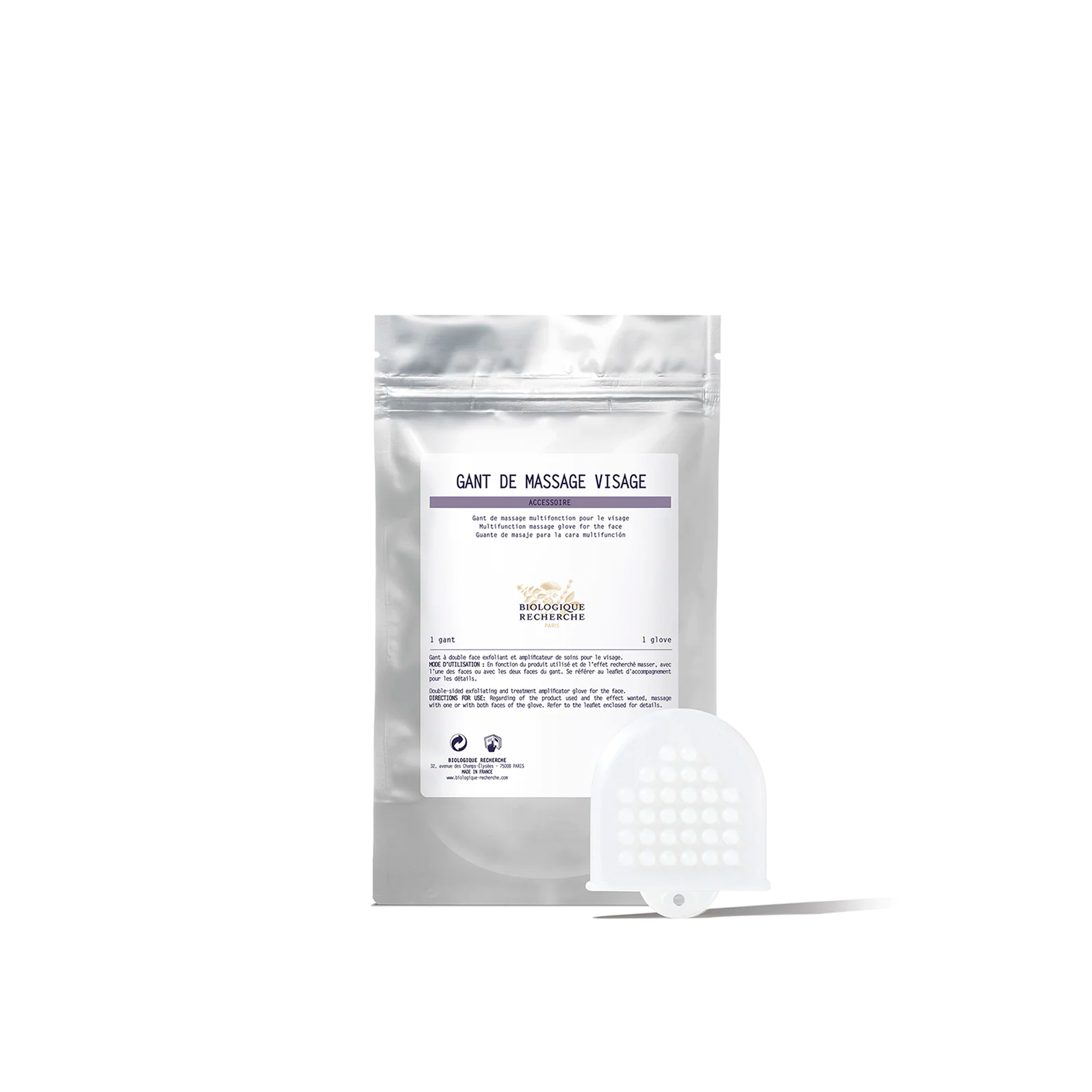 A packaged Biologique Recherche facial massage glove, with the product visible in front of the package.