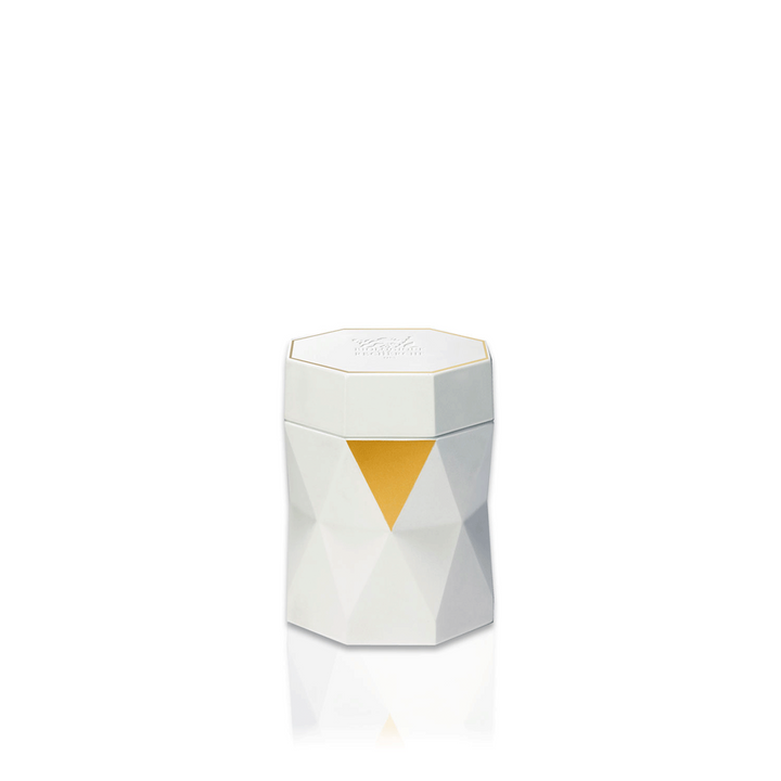 A custom-made artisanal packaging with gold features containing the Biologique Recherche La Grande Crème anti-aging cream.