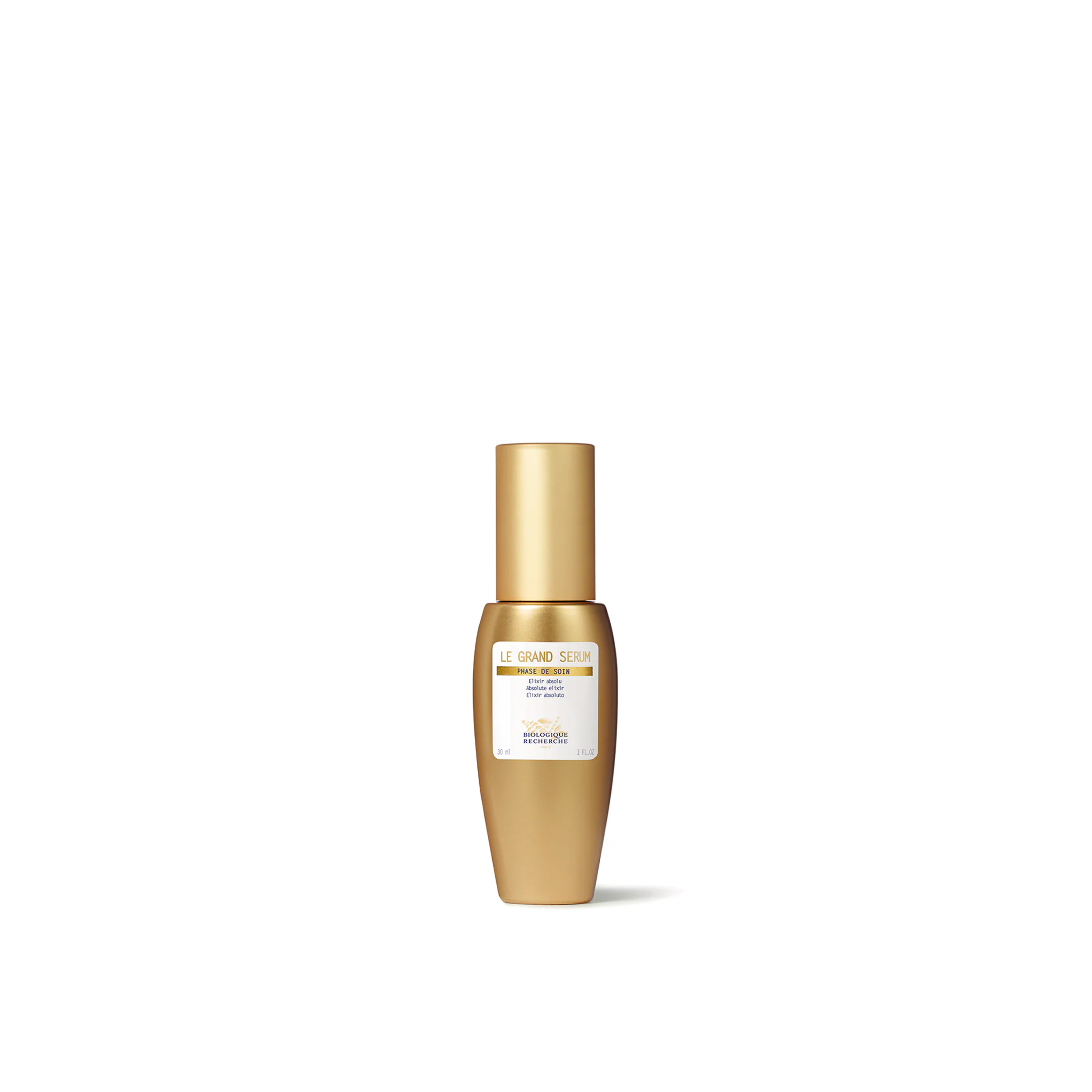 A golden glass bottle of Biologique Recherche Le Grand Serum, presented against a white background.