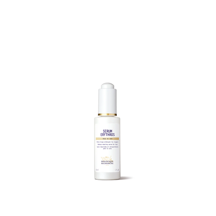 A white bottle with a dropper containing Biologique Recherche Serum Erythros, designed for skincare.