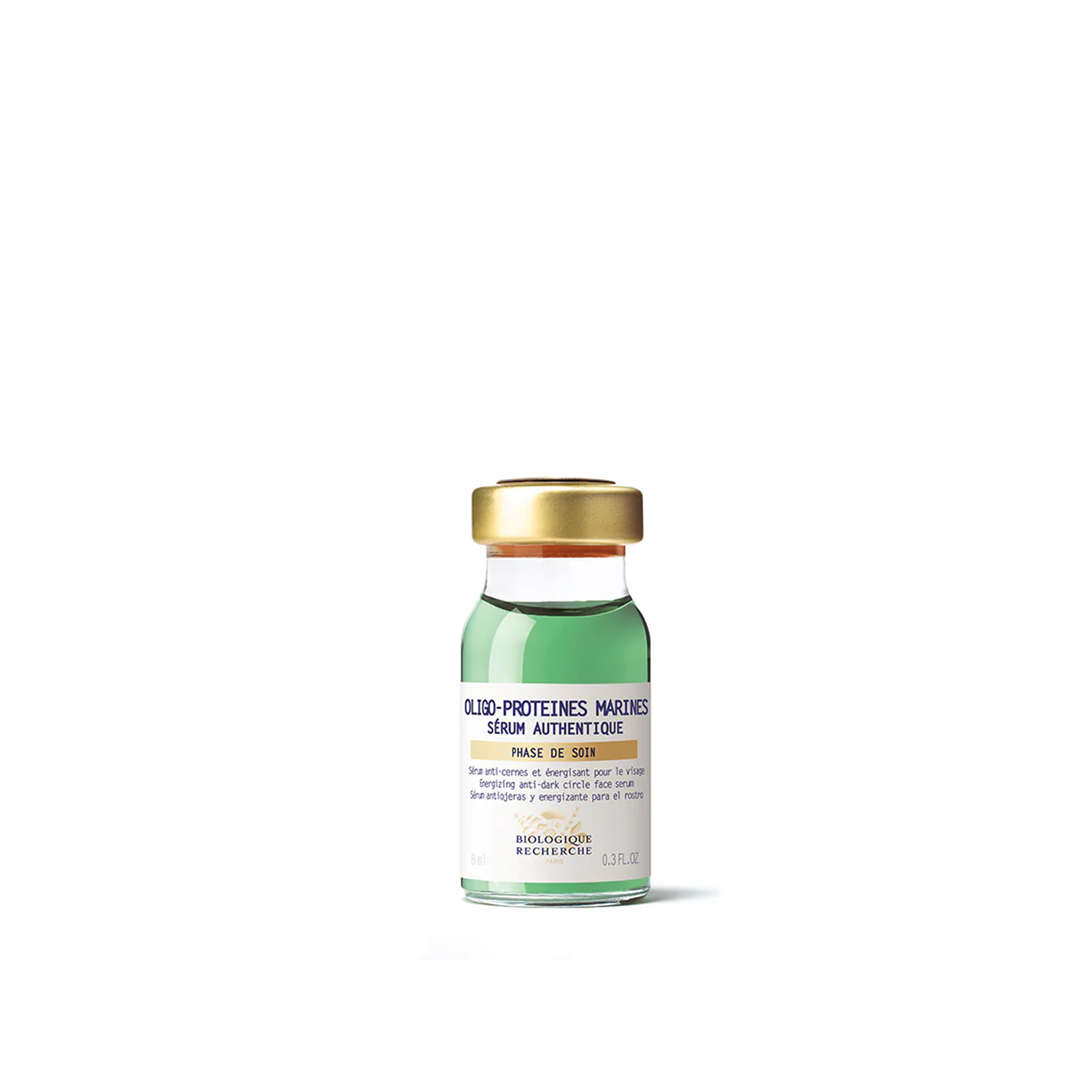 A bottle of Biologique Recherche Serum Oligo-Protéines Marines with a white label, green text, and a gold cap.