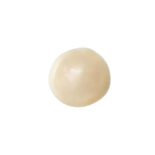 A product swatch of a pale yellow serum