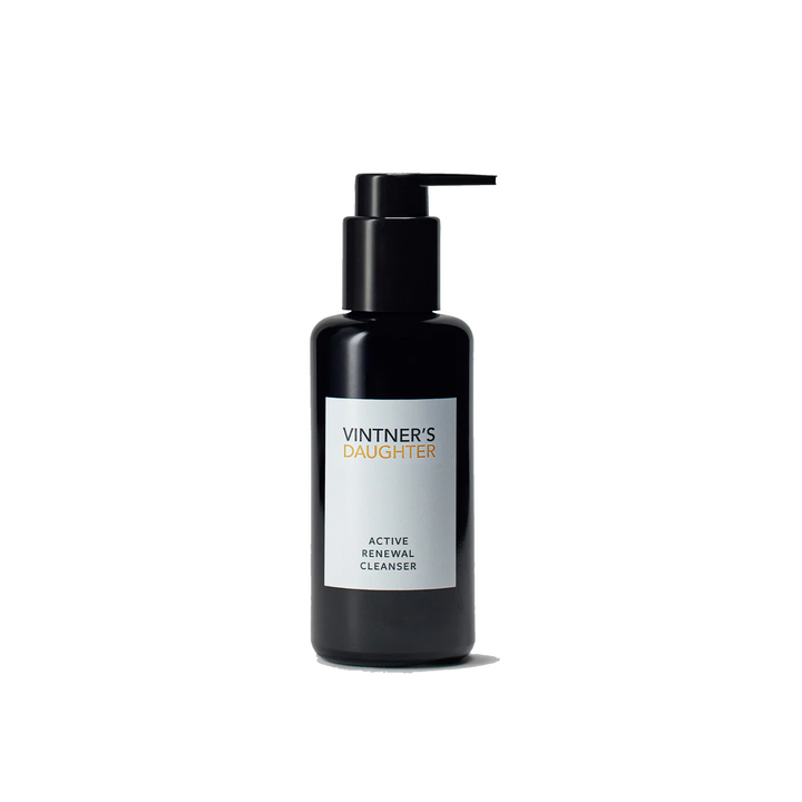 A black pump bottle of Vintner's Daughter Active Renewal Cleanser with white and silver text labeling.