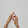 A GIF showing Serum Elastine in a glass vial