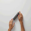 A GIF showing a bottle of Auteur Density cream